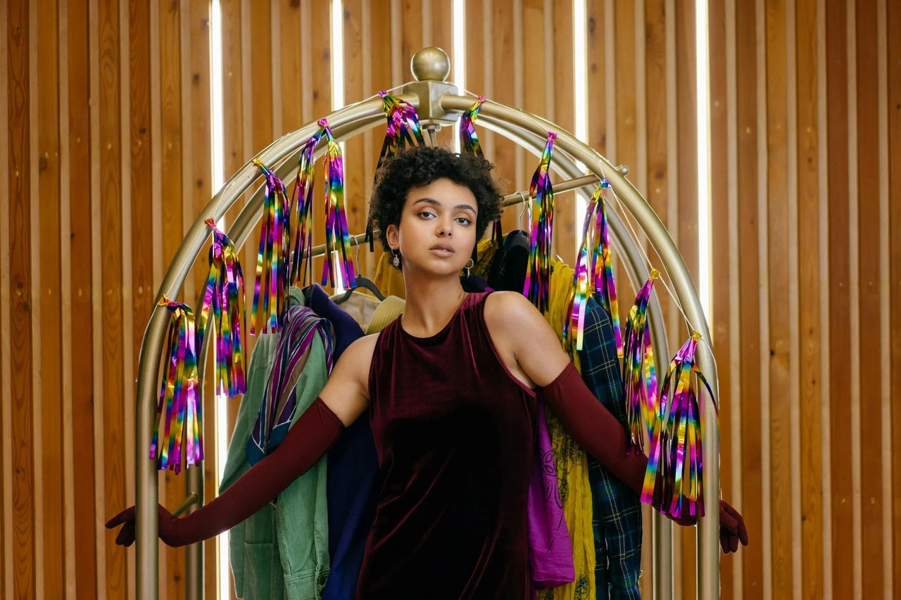 A woman in front of Fringe Backdrop.