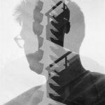 Black and white double exposure portrait with stairs in the middle.
