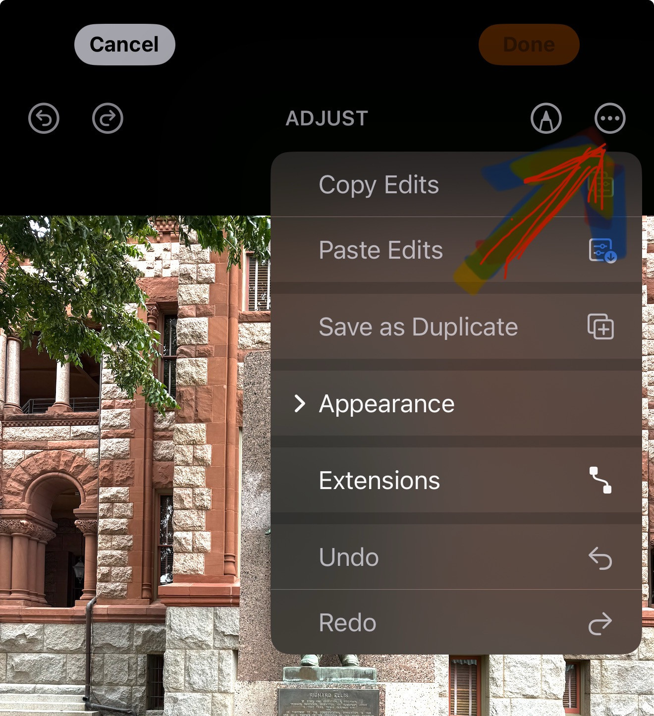 Screenshot of iPhone photo editing interface showing the crop and straighten tools