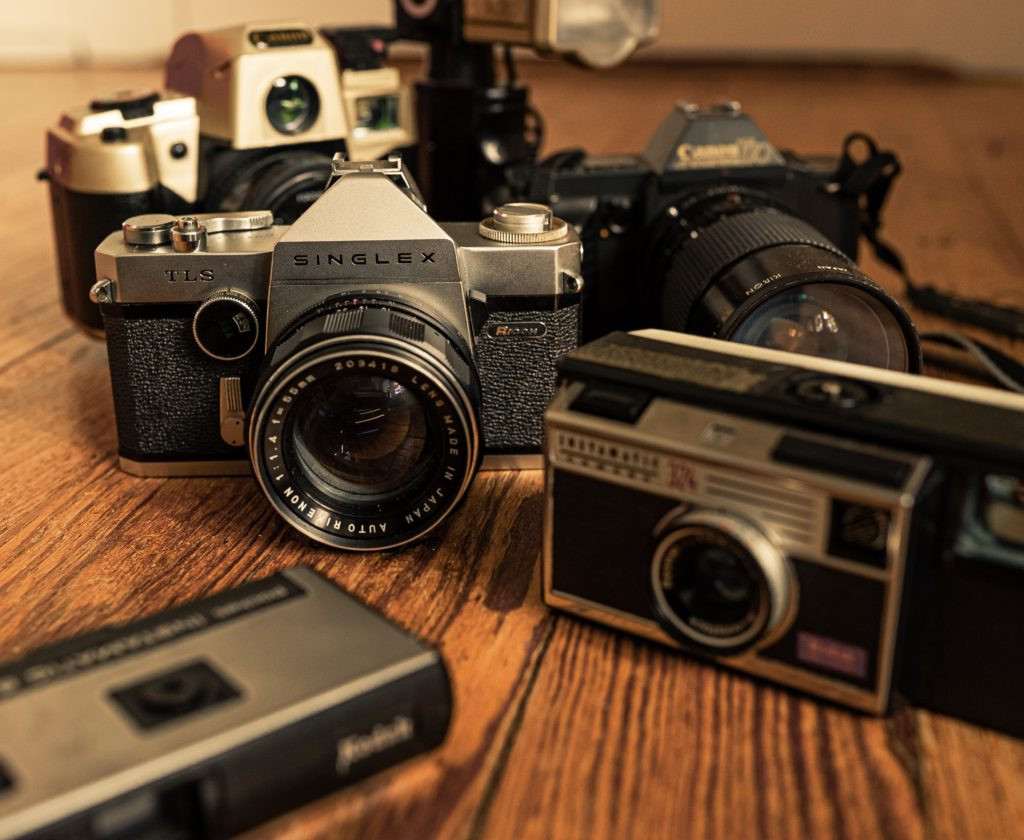 A person using an old camera