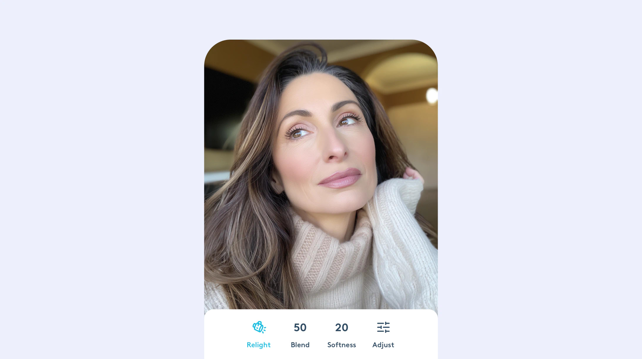 Using photo editing software to make wrinkles less prominent on a person's face