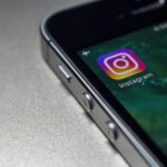 Instagram app icon on a phone screen
