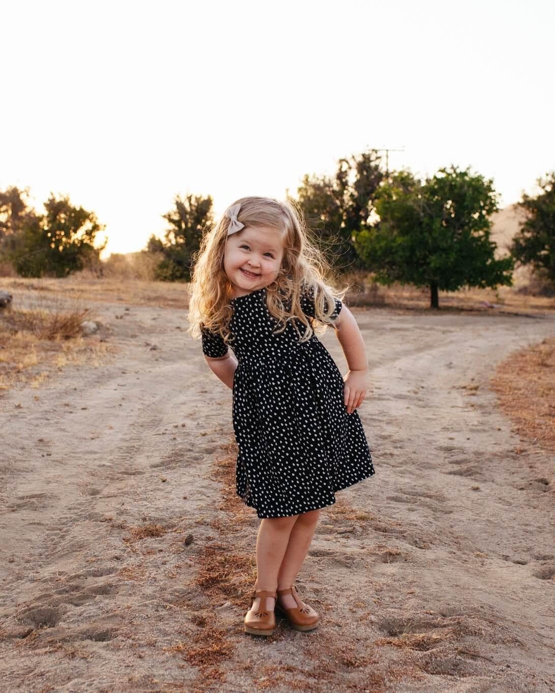 Capturing Personality: A young girl with a genuine princess smile, showcasing her personality in an unforgettable photograph