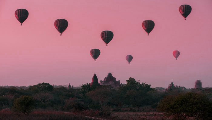 Hot air balloons over Bagan, Myanmar, illustrating the importance of timing in capturing the perfect moment