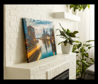 A canvas print displayed on top of a white fireplace, creating a focal point in the living room