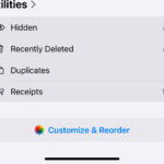 iPhone Photos app showing the location of the Hidden album in the Utilities section