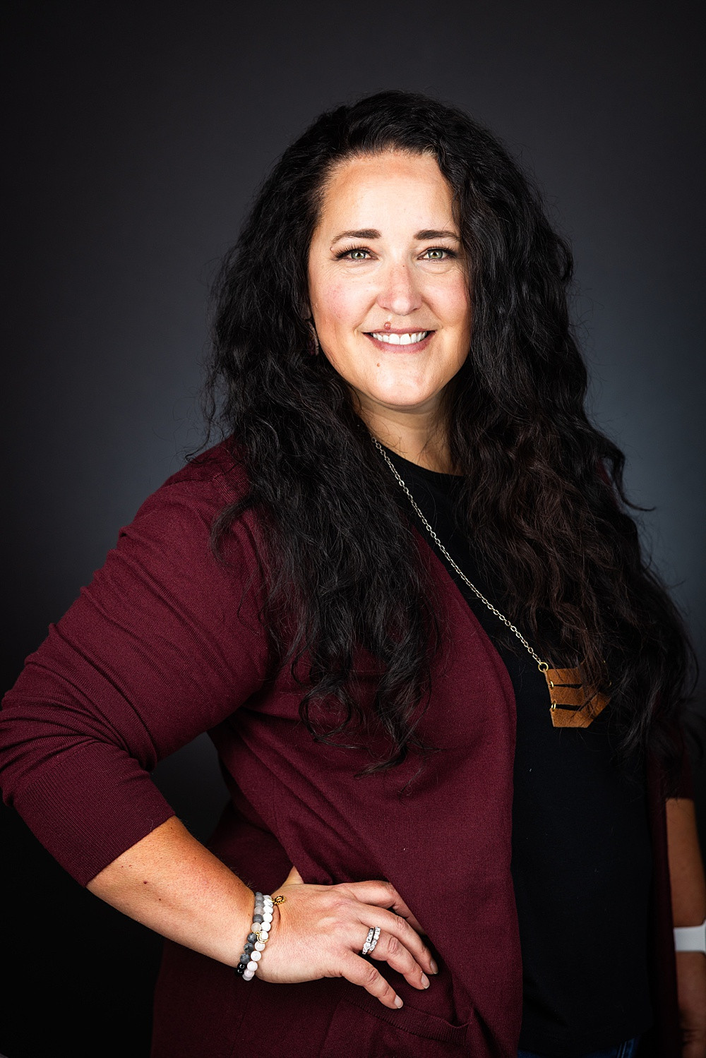 Professional headshot with long sleeve shirt