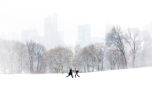 Enhanced photo of a couple in Sheep Meadow with added color, contrast, and a white vignette