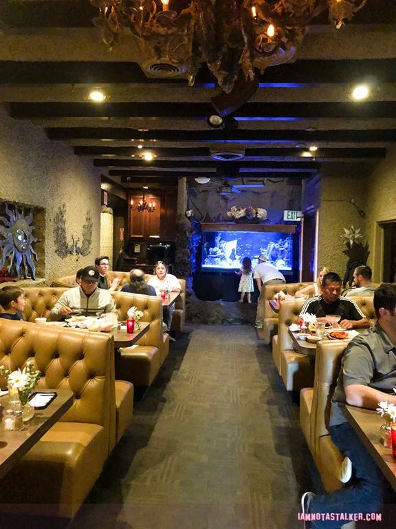Diners enjoying the cozy ambiance and delicious food at Don Antonio's