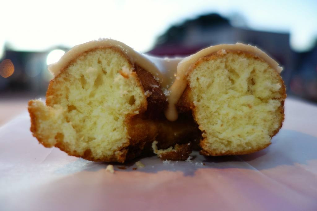 A second view of the maple glaze cake donuts from A Baker's Wife's Pastry Shop, emphasizing the delicious appearance