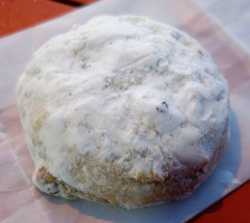 A Russian tea cookie from A Baker's Wife's Pastry Shop, showcasing its delicate and powdery texture
