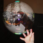 Photographer taking photos in a bubble composite