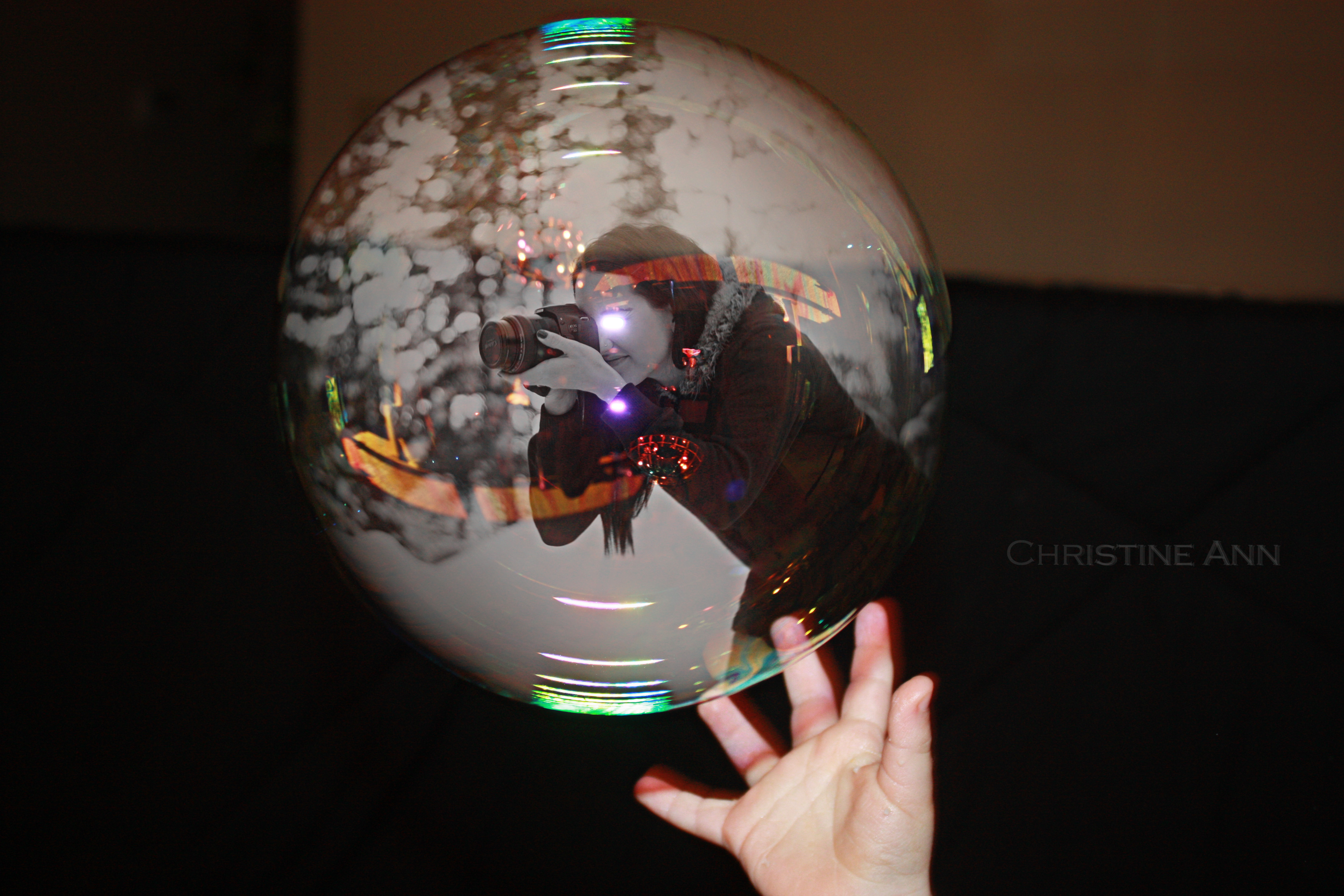 Photographer taking photos in a bubble composite