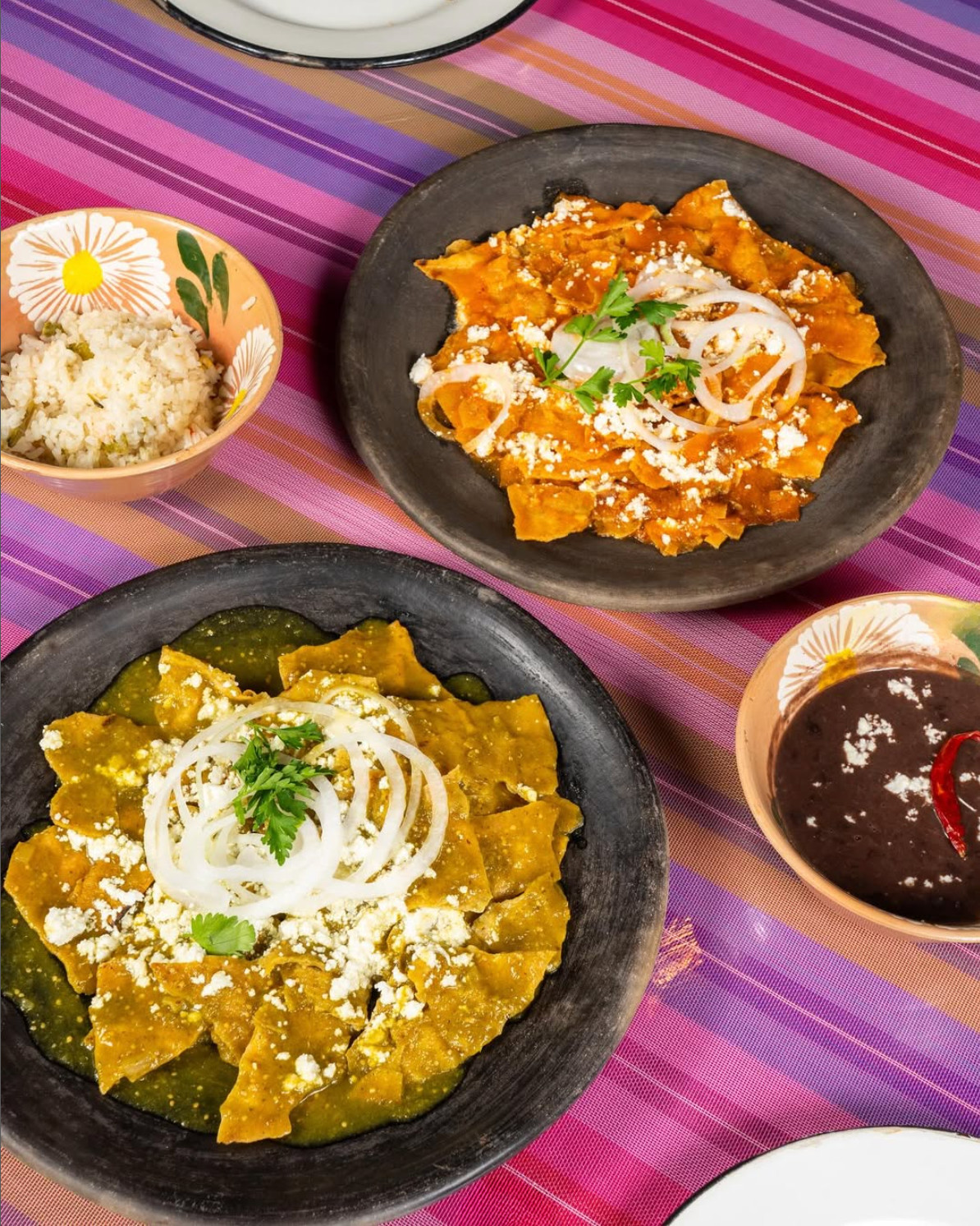 Green and red chilaquiles.