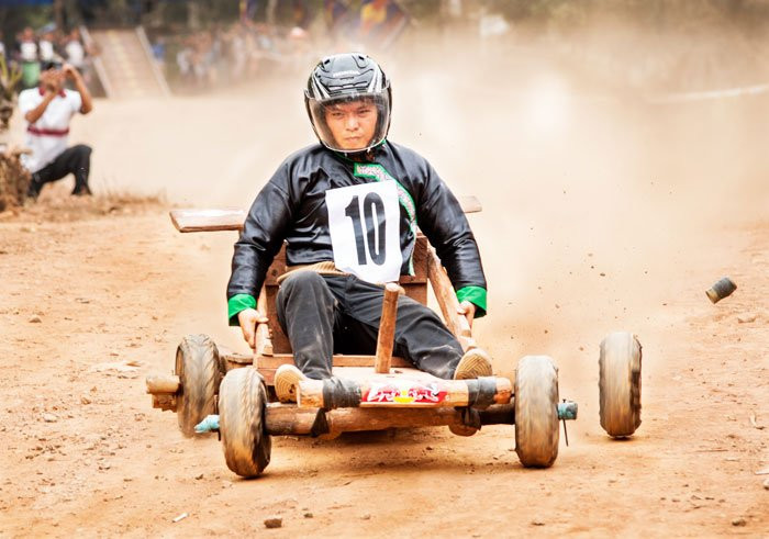 Hmong Kart Racing, taken during a Chiang Mai Custom Photography Workshop, demonstrating the significance of timing in action shots