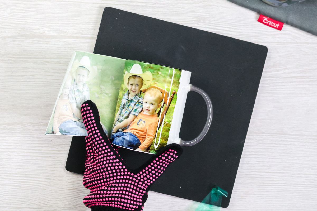 Image of removing sublimation paper from a mug