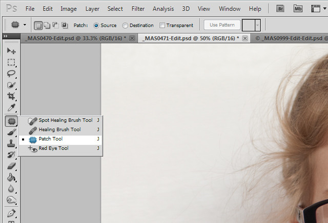 Using the Patch Tool to remove glare from glasses in Photoshop