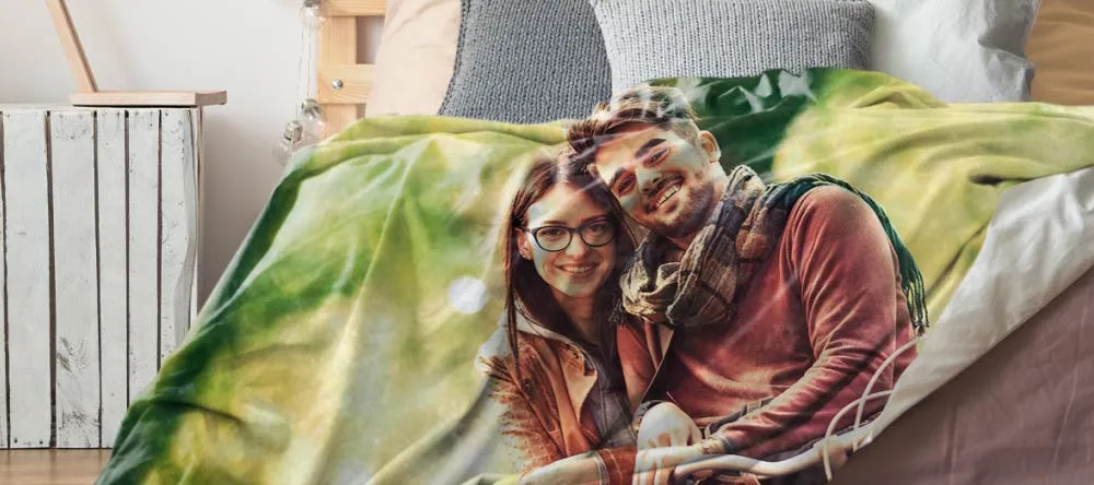 Photo blanket with a family photo, protected in a mesh laundry bag before washing, ensuring gentle care and preventing damage.