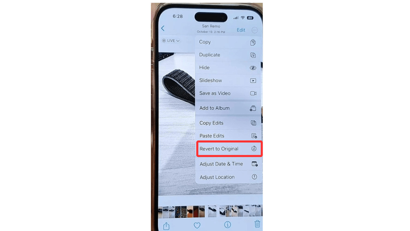 Reverting the photo to its original state using the Revert option in the editing menu