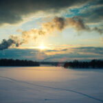 Winter photography preparation including warm clothing, gloves, and sunglasses