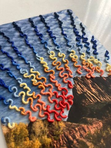 Close-up of metallic thread embroidery