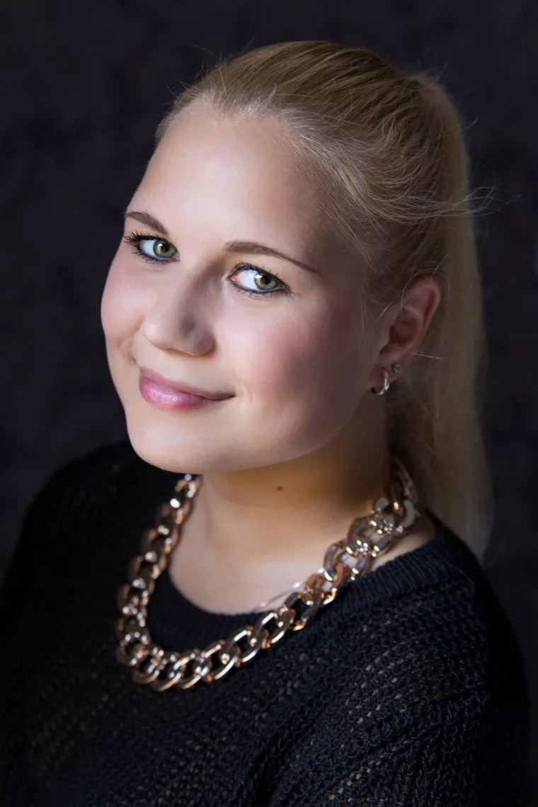 Portrait shot near a window with soft lighting