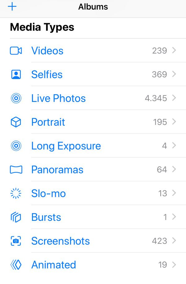 Accessing the Live Photos album in the Photos app to view all Live Photos
