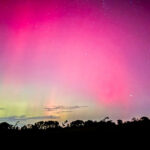 iPhone on a tripod capturing the aurora borealis at night