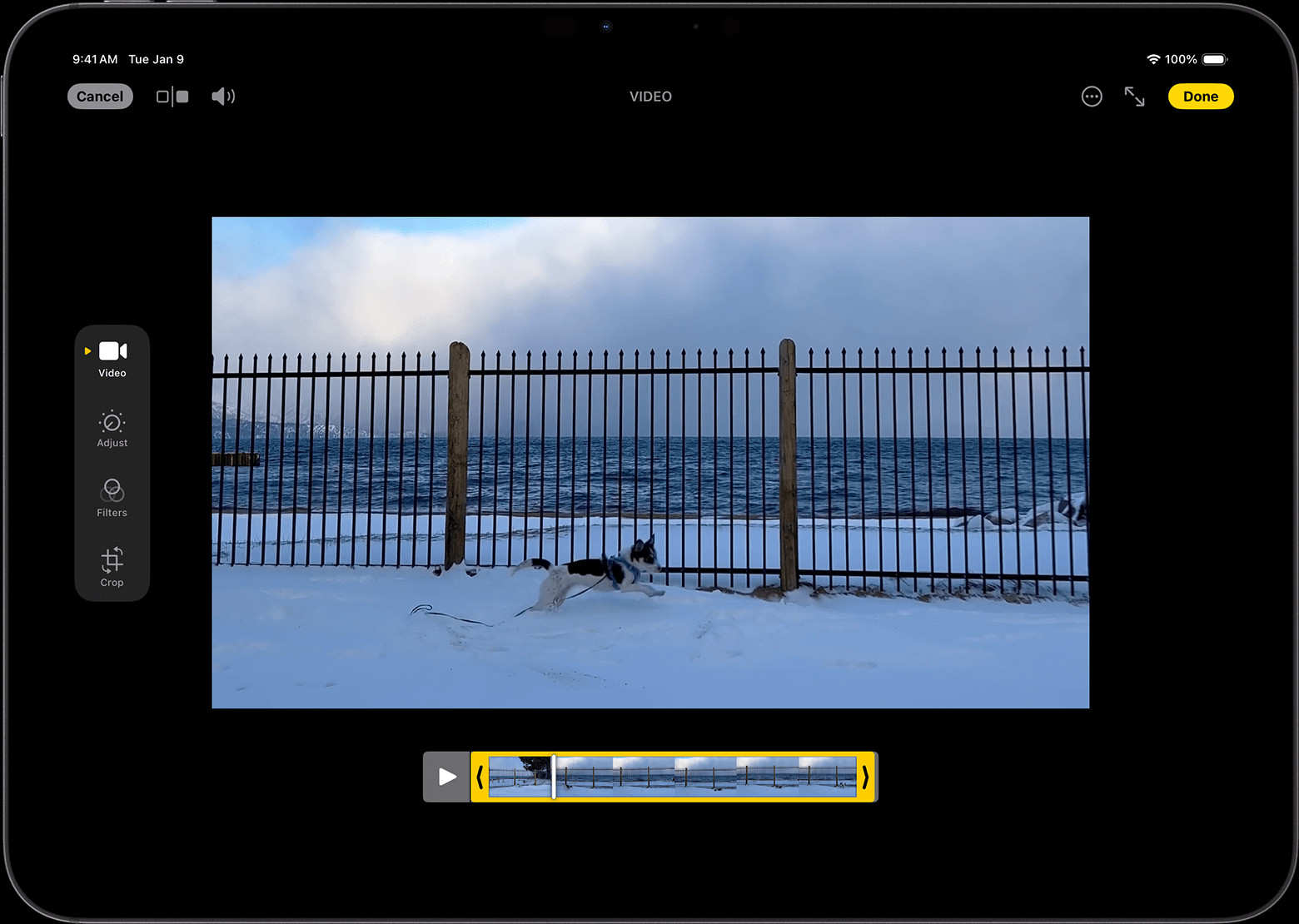 iPad showing a video in edit mode with trim sliders, perfect for learning how to edit a video in photos.