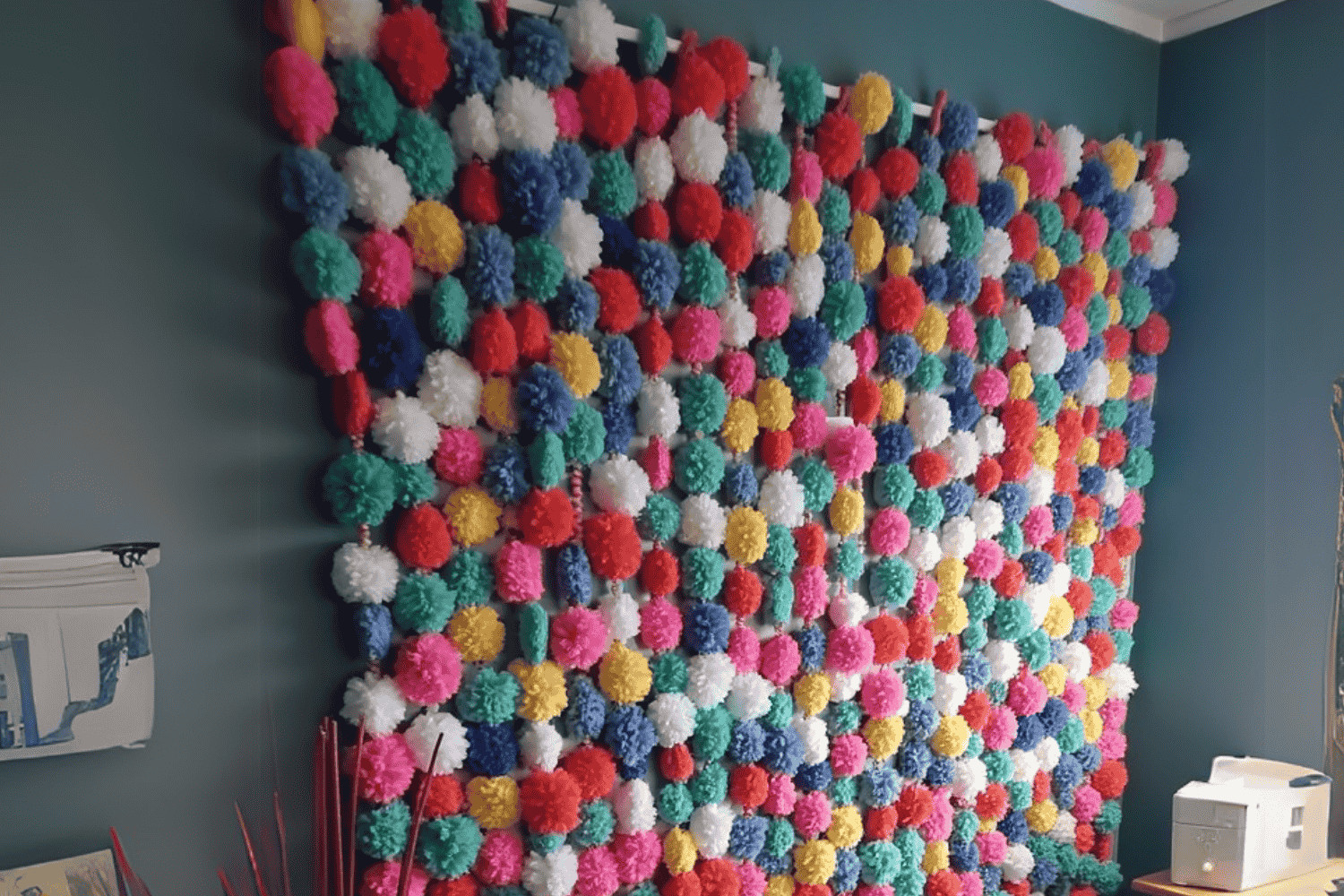 DIY Pom Pom Backdrop