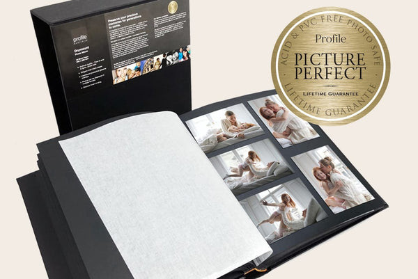 Close-up shot of a Profile dry mount photo album, emphasizing the lifetime guarantee and the archival quality of the materials used.
