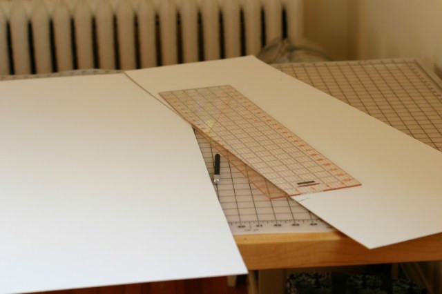 White poster board curved inside a lightbox to create a seamless background, eliminating harsh lines and shadows