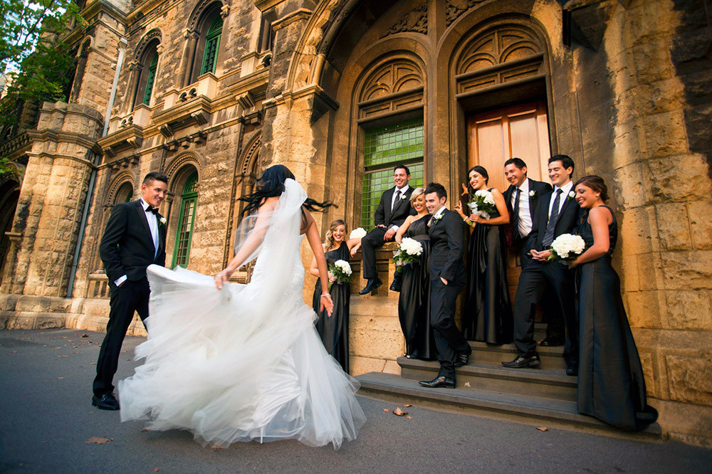 Bride and groom posing in a scenic outdoor location