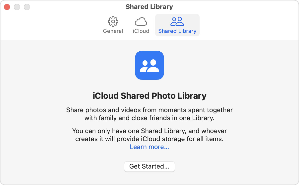 Accessing iCloud settings within the Photos app on macOS to create a Shared Library.