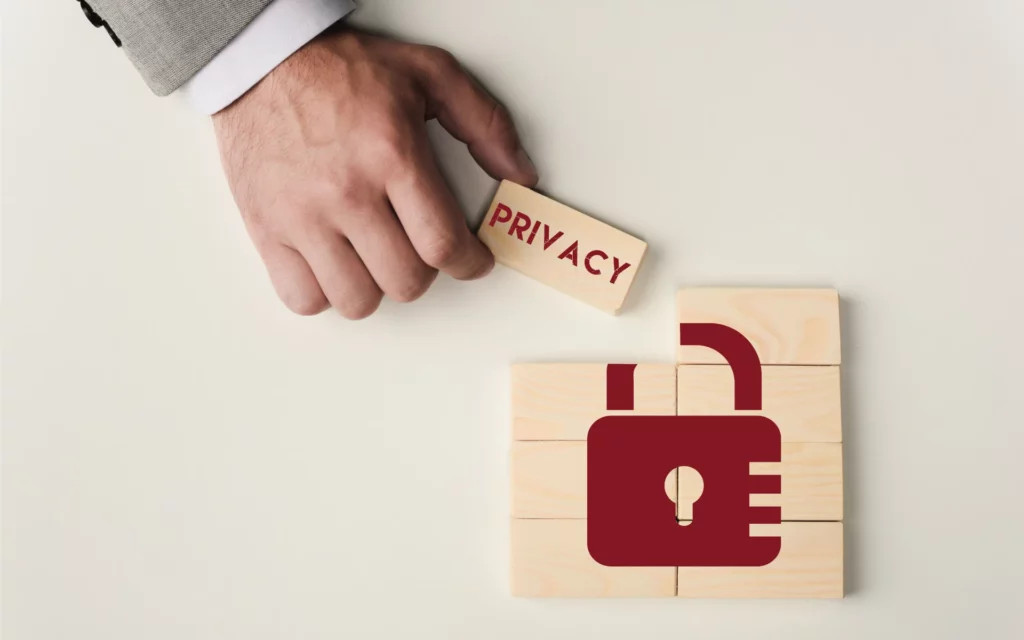 Brick wall with the word privacy, symbolizing the importance of data protection and user rights