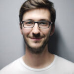 Close-up portrait of a man smiling, resized to 600x600 pixels, optimal lighting, high resolution, dfphoto.net
