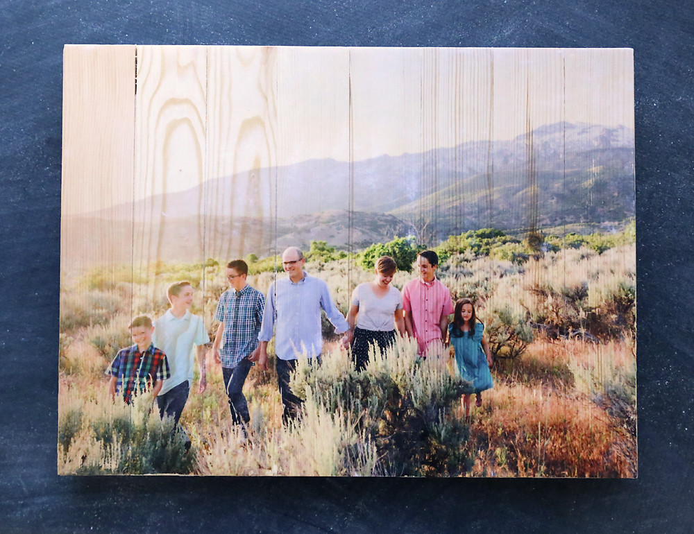 Wood pallet photo transfer project showing a Mod Podge sealer applied