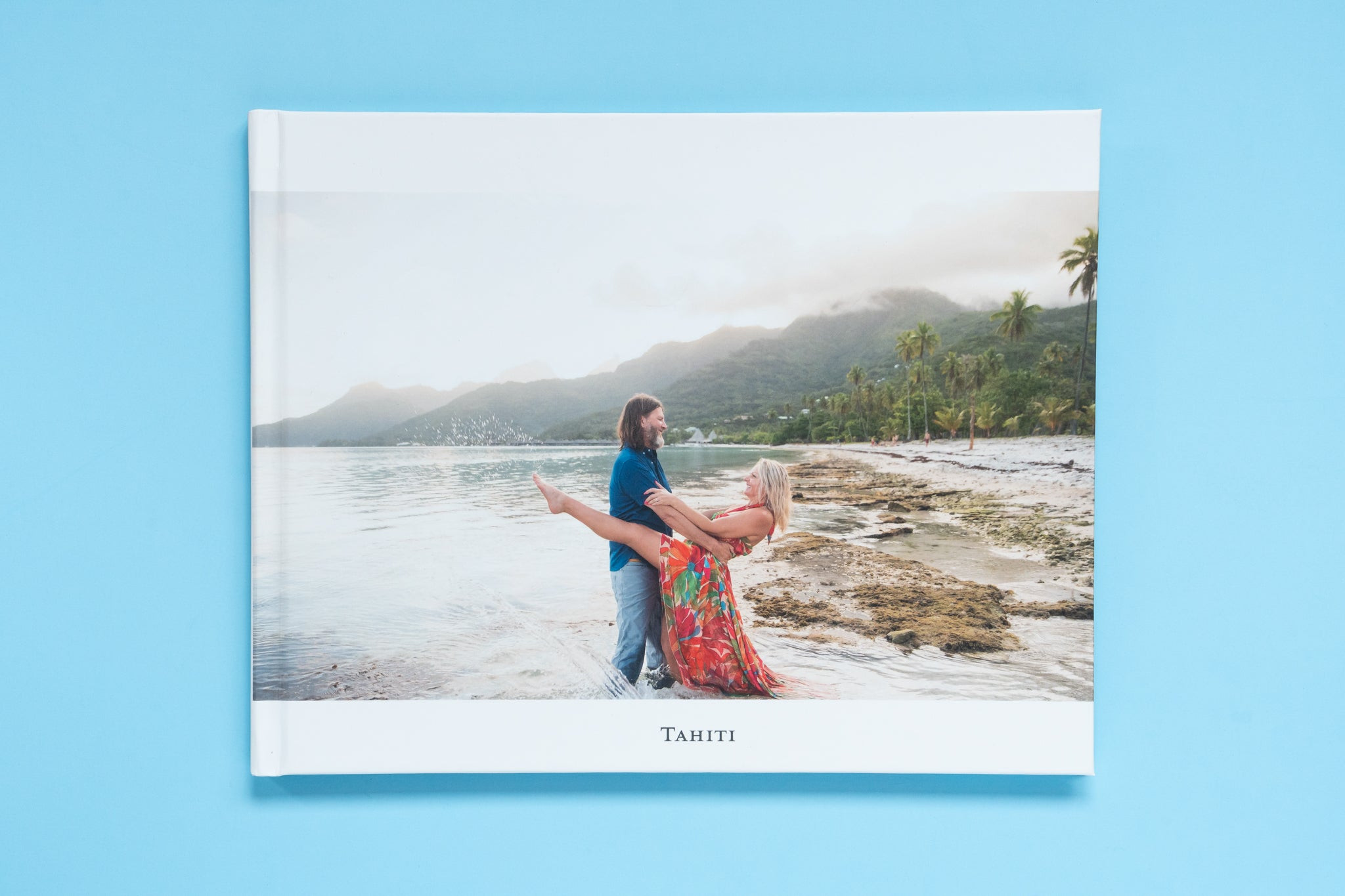 Mixbook photobook featuring a couple on the cover, renowned for its user-friendly design and vibrant colors