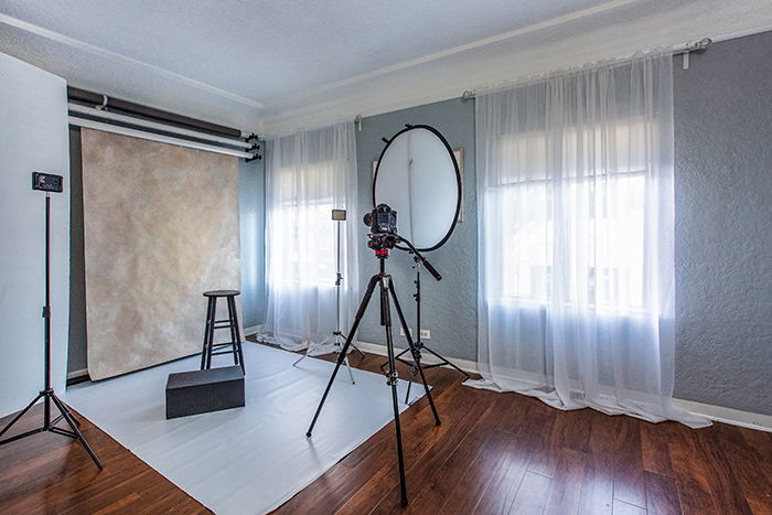 Home studio space for a freelance photographer, showcasing organized equipment and a creative workspace