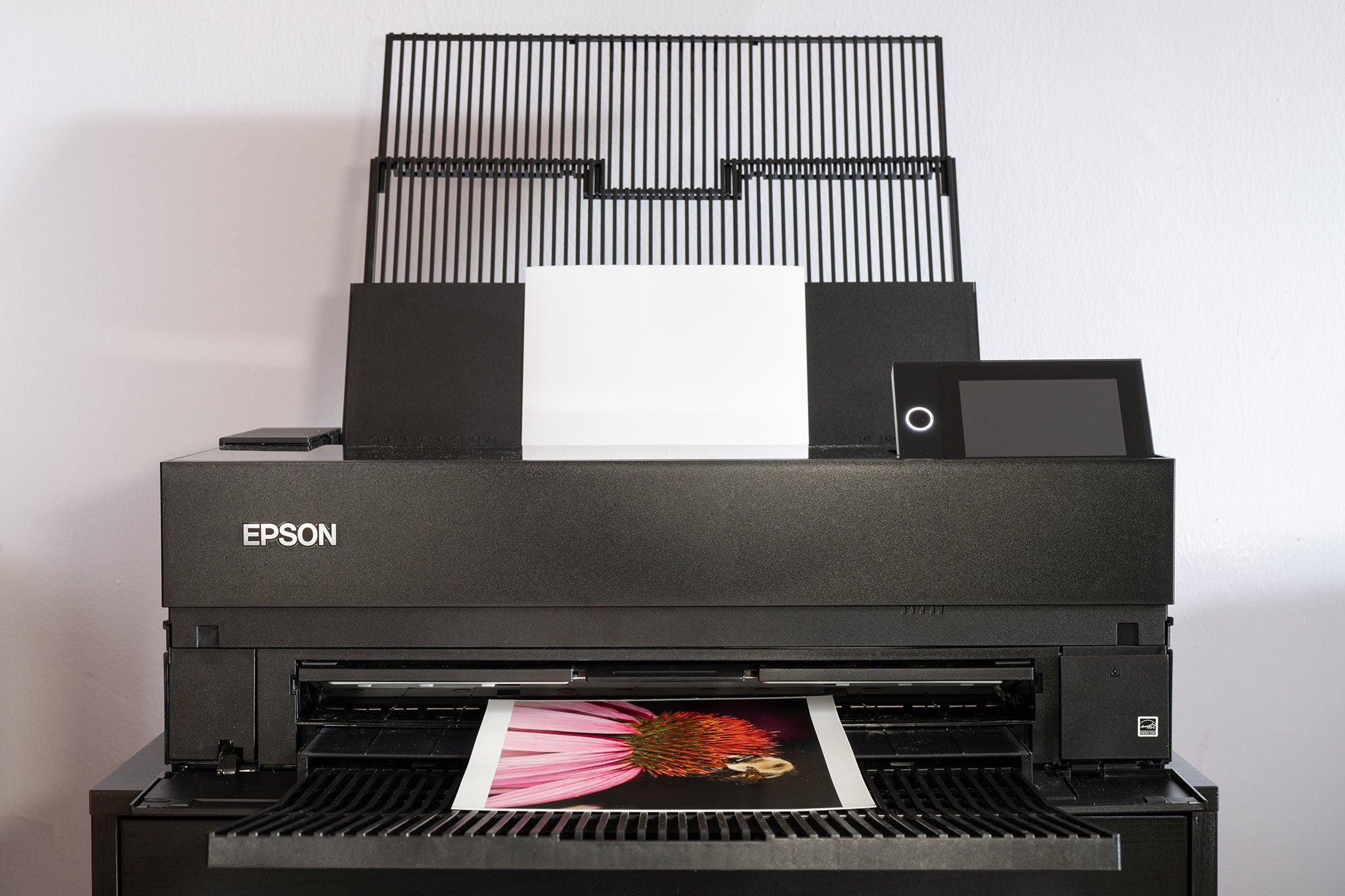 The Epson SureColor P900 photo printer printing out a photo.