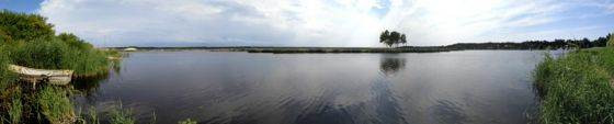 Photosynth app interface on an iPhone, showing a partially completed panorama