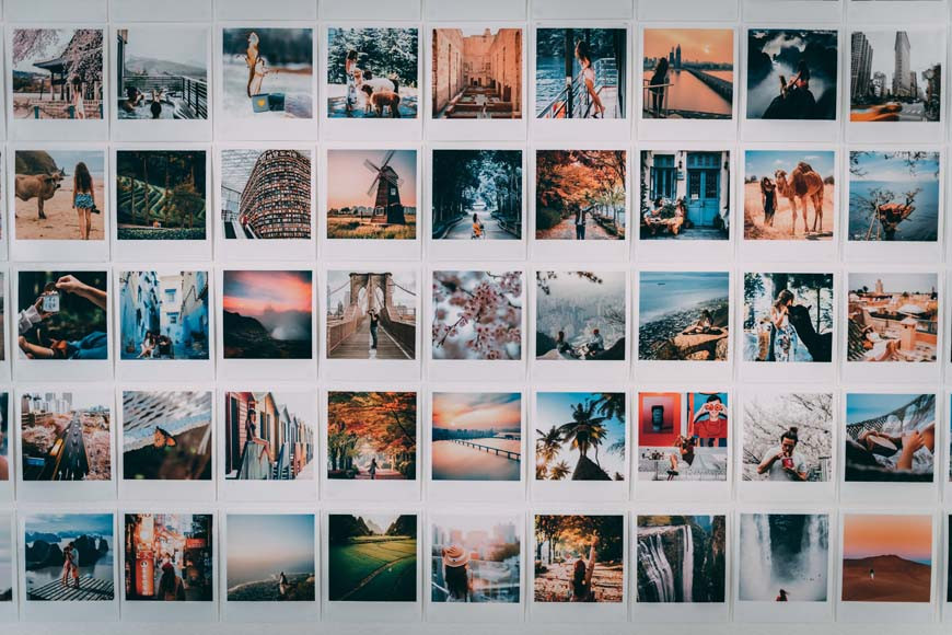 Collection of old Polaroid photos arranged in a collage pattern, highlighting the nostalgic aesthetic of instant film photography.