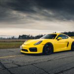 Car photo before Lightroom edit, showing flat colors and lack of impact