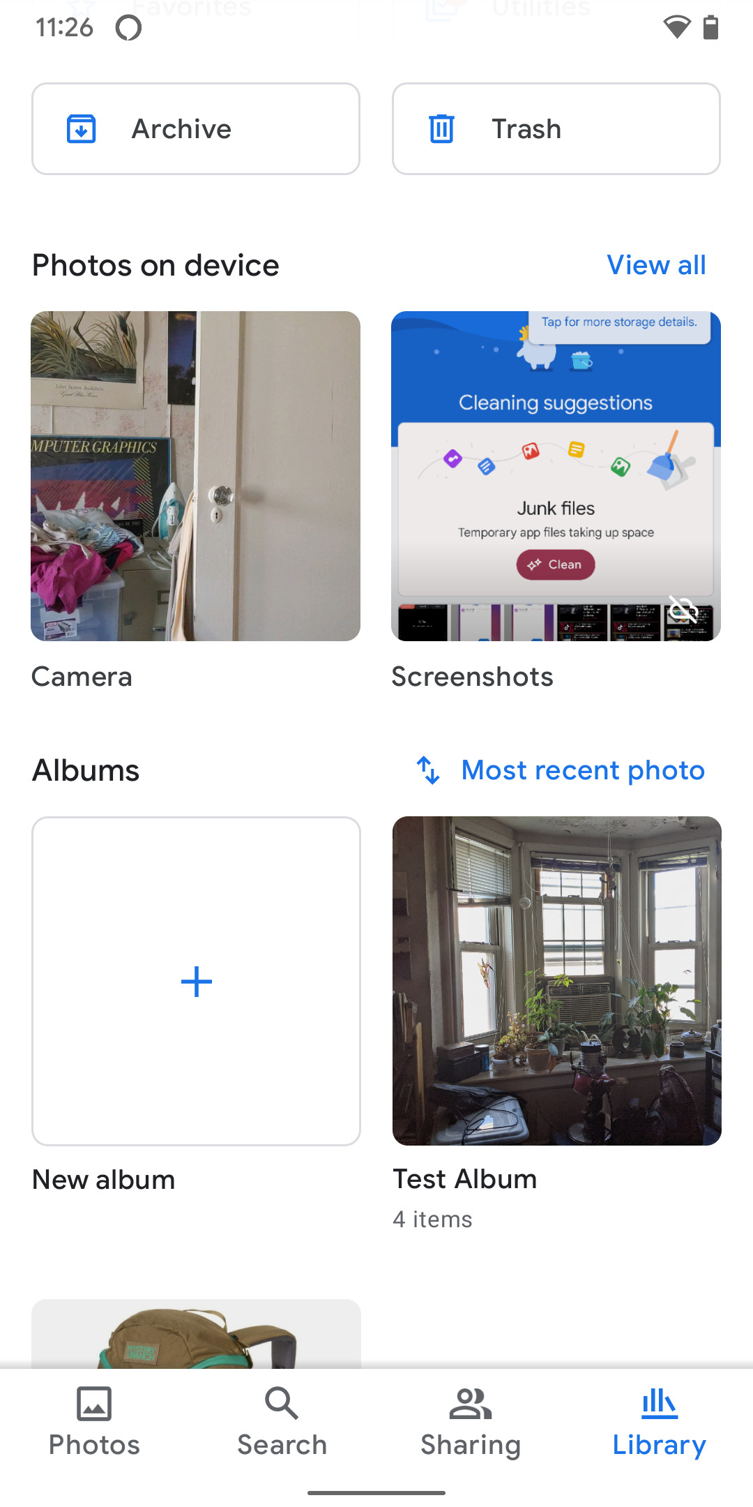 Accessing the library tab to find albums in Google Photos app