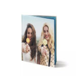 A Shutterfly photo book spread featuring a combination of images and text captions
