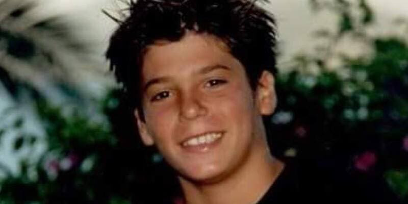 Can Yaman as a teenager, showcasing his early passion for sports and his academic achievements, highlighting his well-rounded upbringing.