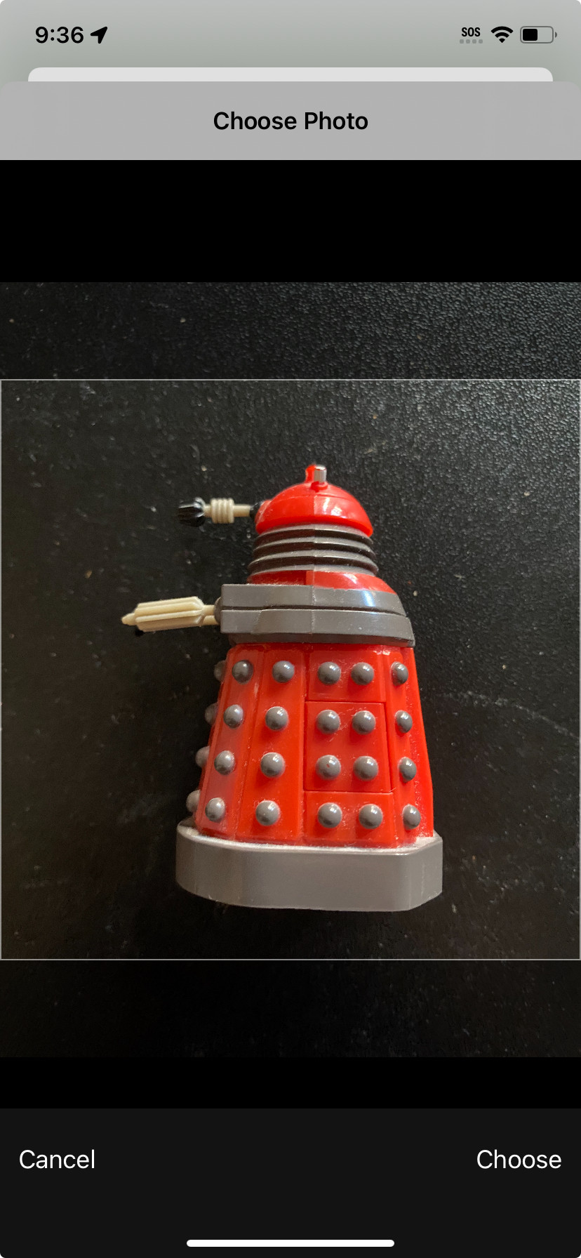 Photo of a toy Dalek being adjusted for use as an app icon
