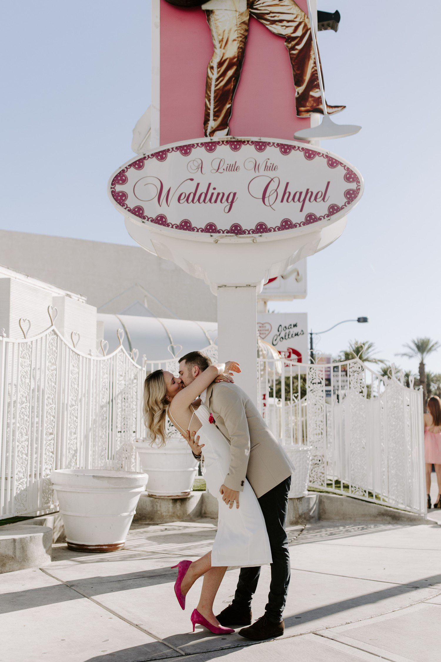 Couple kissing during elopement photos at A Little White Chapel, capturing the love and happiness of their special day